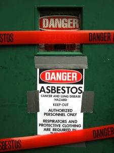 Asbestos warning on factory building door